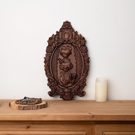 Catholic religious wooden statue depicting Sacred Hearts of Jesus, Mary and Joseph
