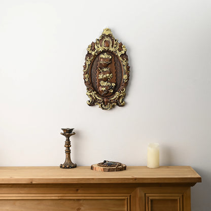 Christian wall decoration with gold-painted wood detailing