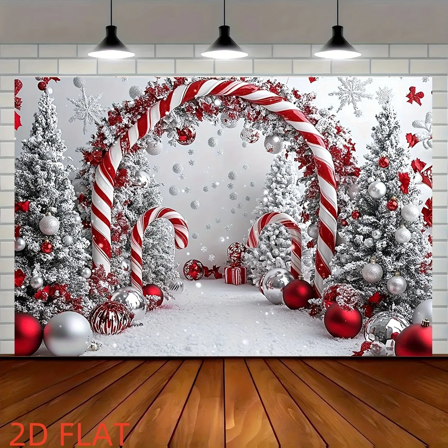 Large Christmas backdrop showing snowy trees, candy cane arches and red and silver baubles hanging on a wall above a wooden floor.
