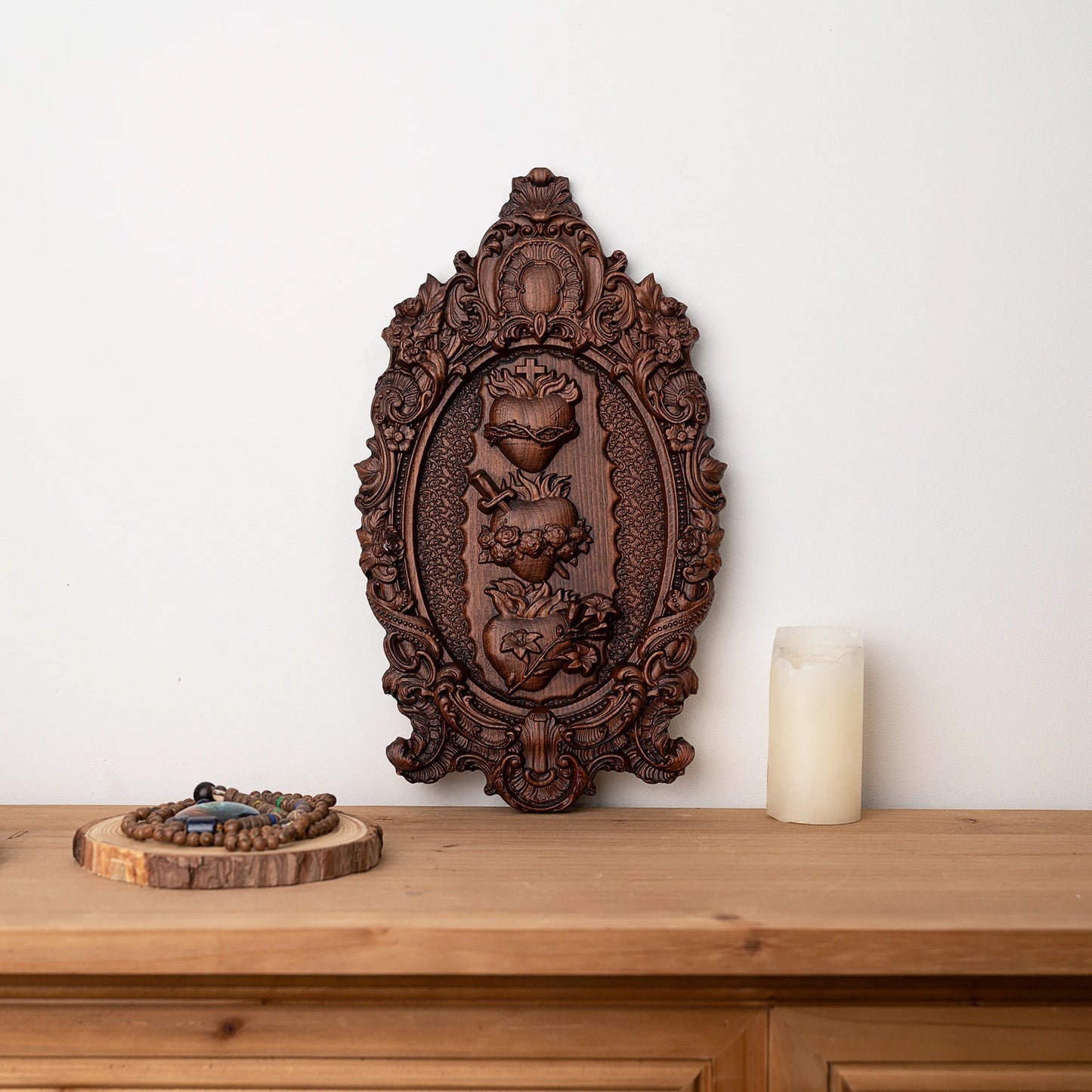 Catholic religious wooden statue depicting Sacred Hearts of Jesus, Mary and Joseph