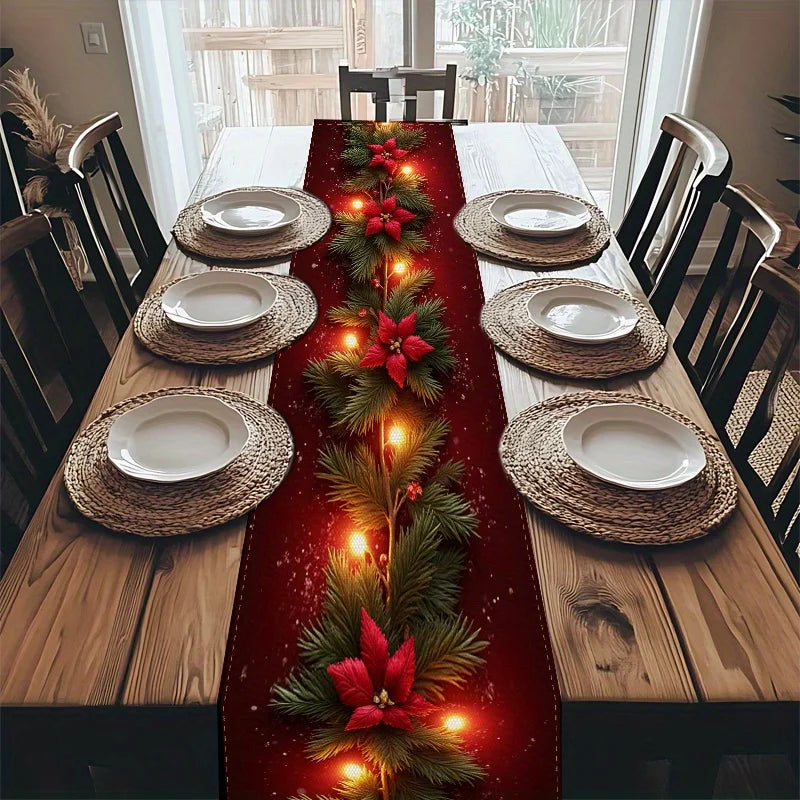Dining table set with a Christmas-themed runner, lights, and decorations.