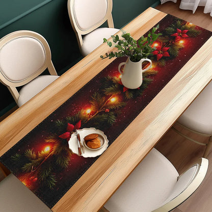 Dining table with a decorative table runner featuring Christmas lights and greenery.