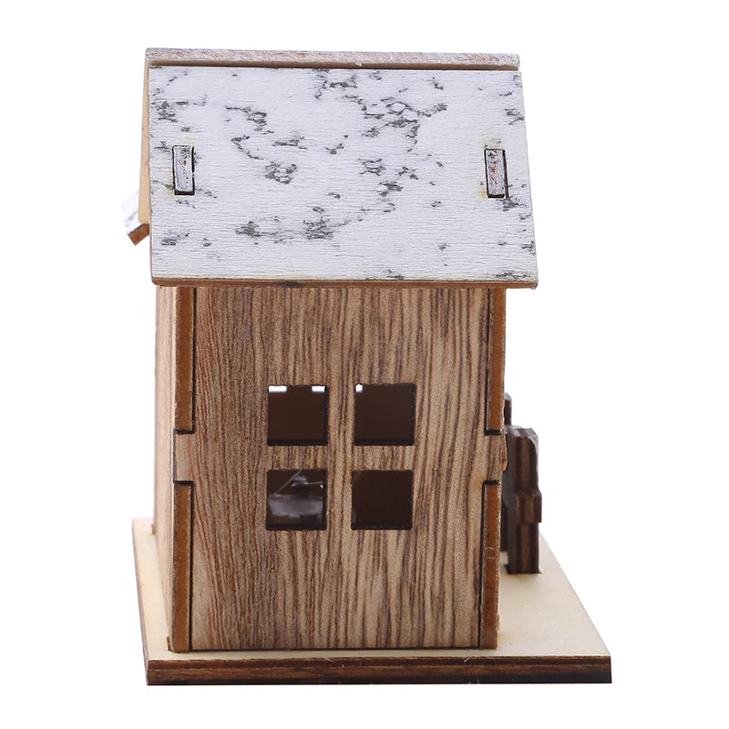 Snowy Wooden LED Christmas House – Warm Glowing Mini Holiday Decoration